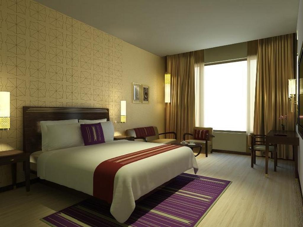 Marasa Sarovar Premiere Tirupati Bagian luar foto A typical room at the hotel