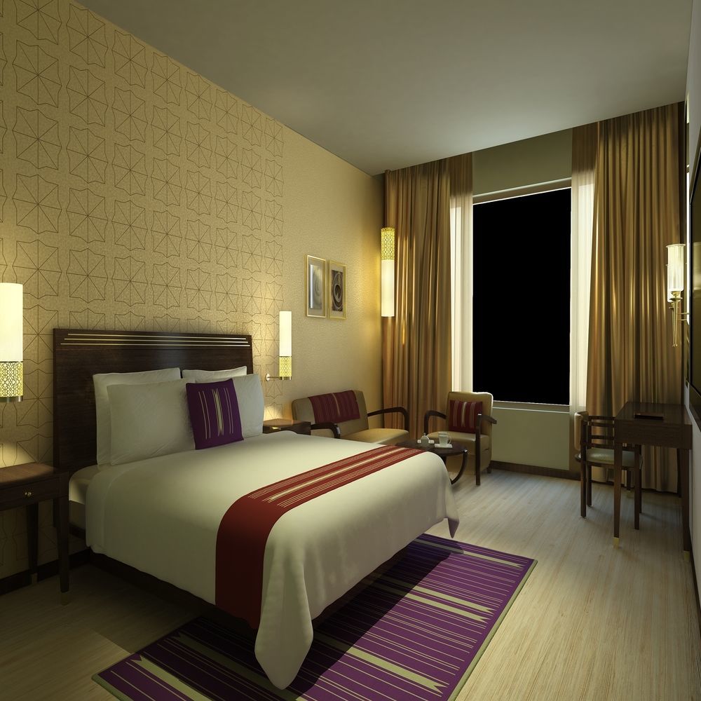Marasa Sarovar Premiere Tirupati Bagian luar foto A room at the hotel