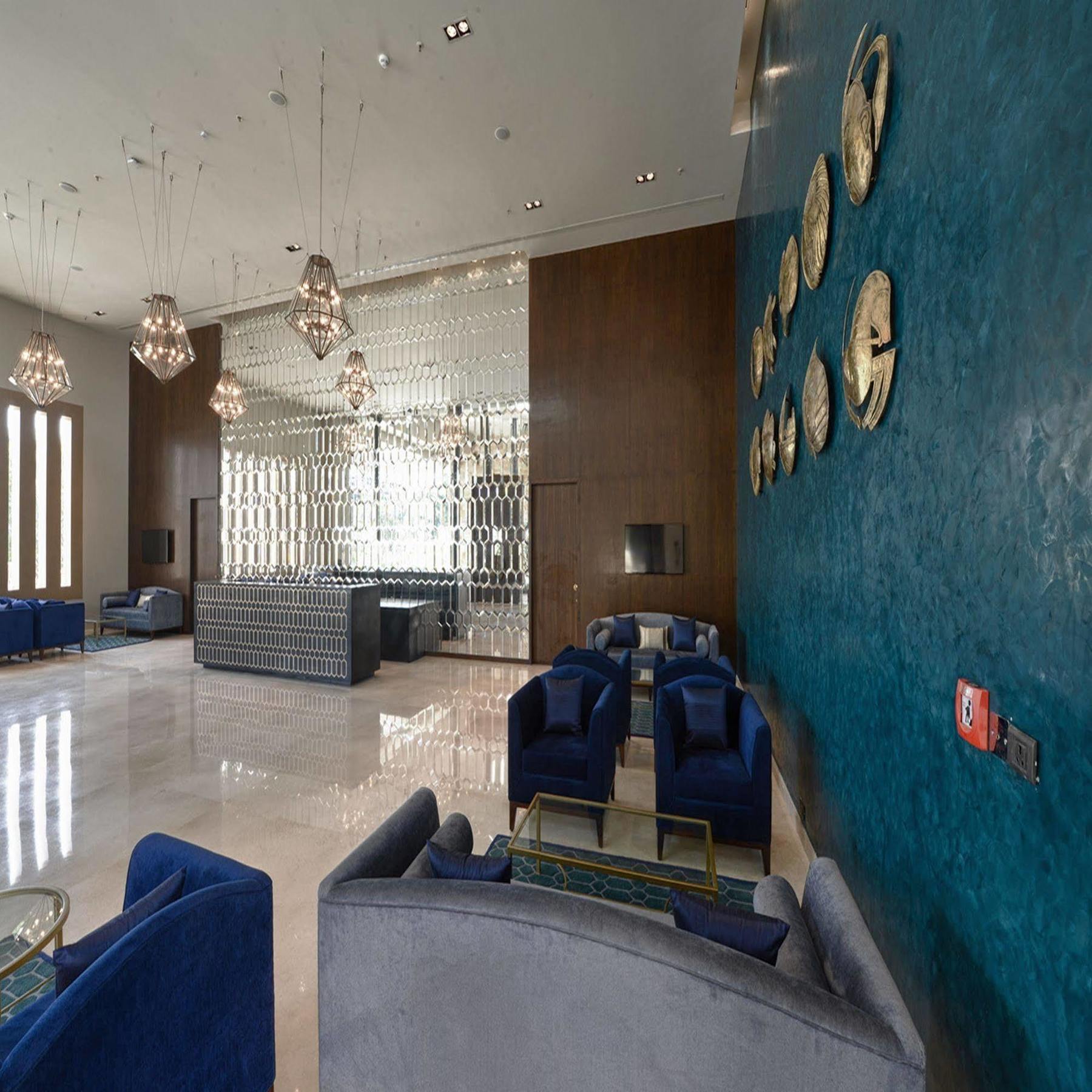 Marasa Sarovar Premiere Tirupati Bagian luar foto The lobby of the hotel